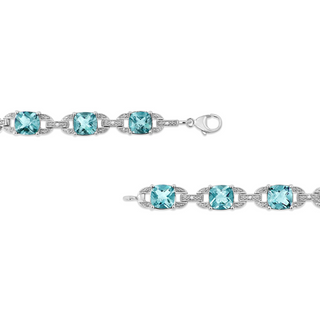 .925 Sterling Silver 7x7 mm Cushion Cut Blue Topaz and 1/20 cttw Round Cut Diamond Fashion Tennis Bracelet (I-J Color, I1-I2 Clarity) - 7"